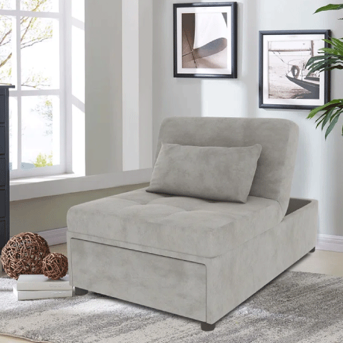 Armless sofa bed being used as a comfortable workspace.