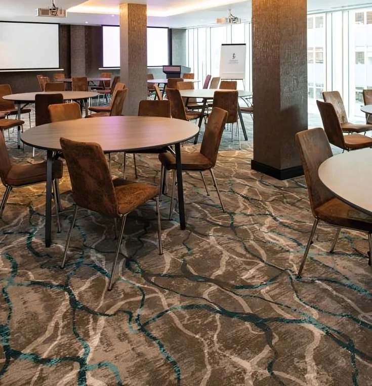 Professional office space enhanced by the addition of a sisal carpet.