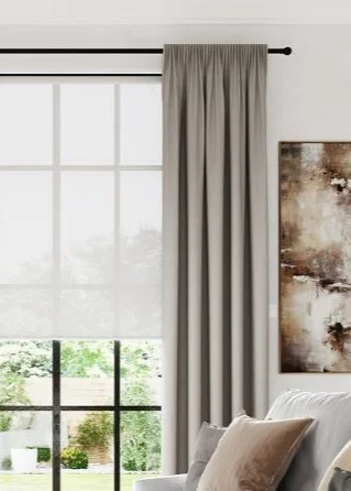 Rustic farmhouse-style curtains with a plaid pattern