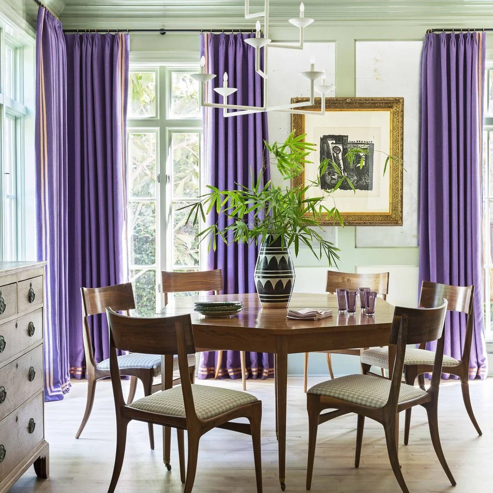 Eyelet curtains hanging on a metal rod
